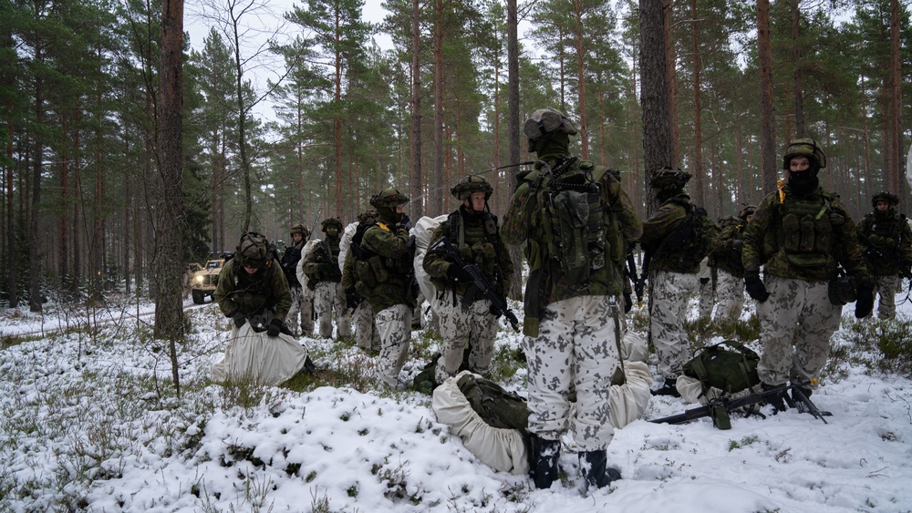 U.S. Marines with Combat Logistics Battalion 6 Transport Finnish Soldiers During Exercise Freezing Winds 22
