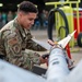 36th and 25th FGS compete in weapons load crew of the quarter competition