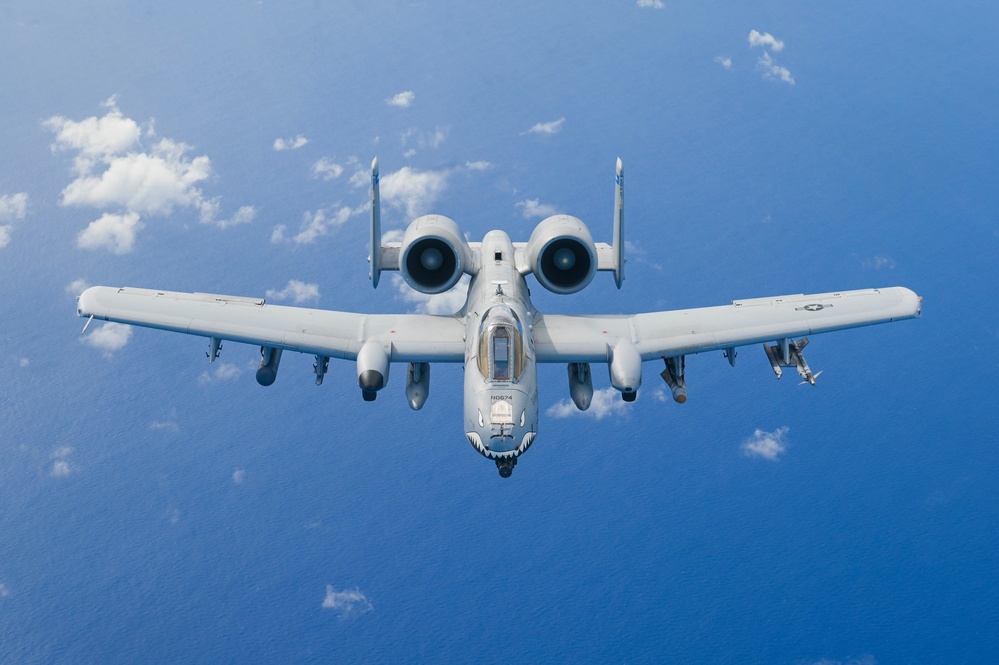 506 EARS aerial refuels Moody A-10C Thunderbolt II over Pacific Ocean