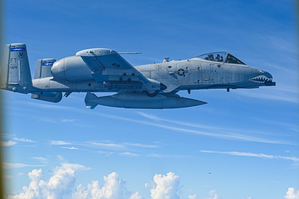 506 EARS aerial refuels Moody A-10C Thunderbolt II over Pacific Ocean