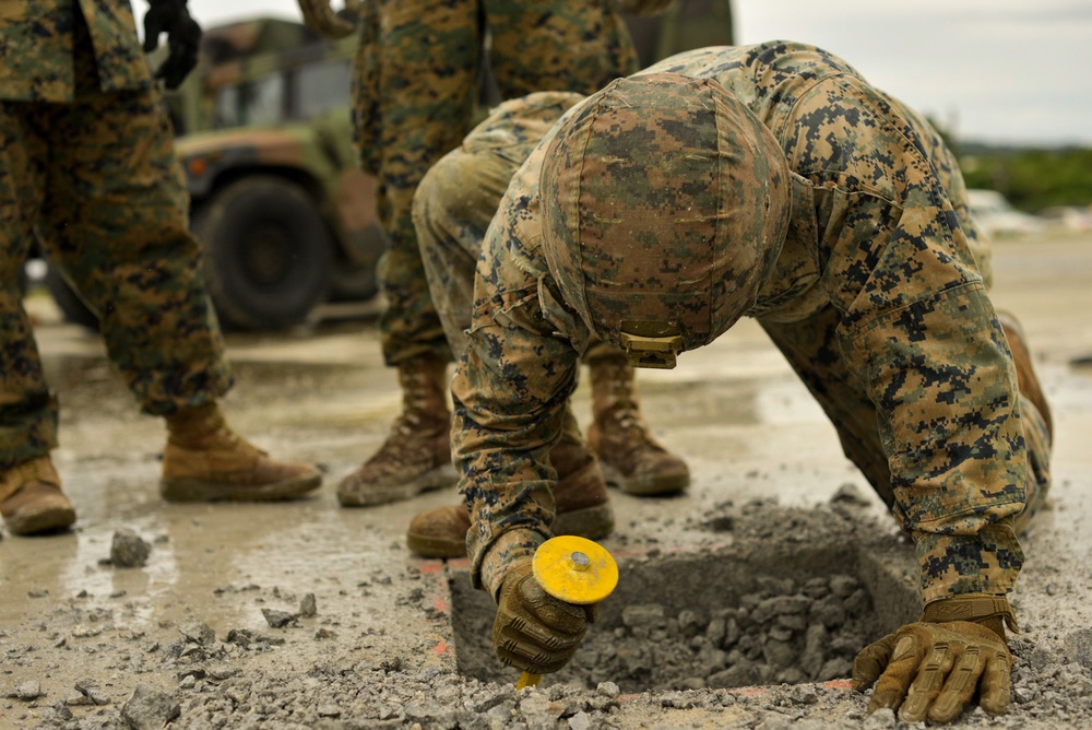 Marines simulate and repair a damaged airfield during exercise Keen Sword 2023.