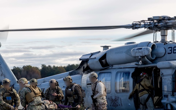 U.S. Marines work with U.S. Navy SEALs