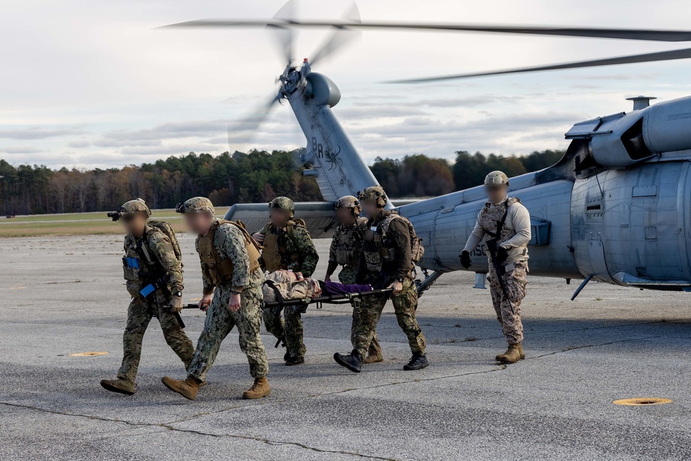 U.S. Marines work with U.S. Navy SEALs