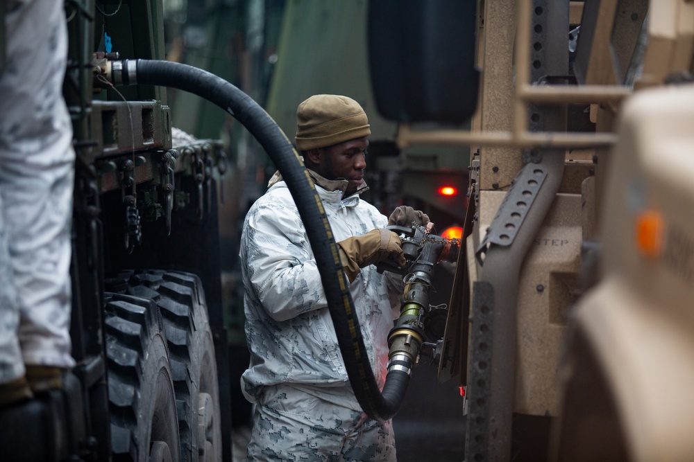 U.S. Marines with Combat Logistics Battalion 6 Conduct Motor Transport Convoy Refuel in Finland