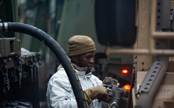 U.S. Marines with Combat Logistics Battalion 6 Conduct Motor Transport Convoy Refuel in Finland