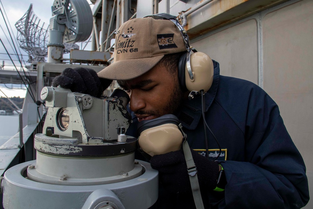 U.S. Navy Sailor Plots Bearings