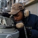 U.S. Navy Sailor Plots Bearings