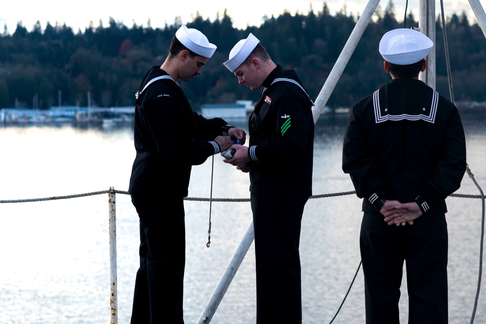 Sailors Fold Ensign