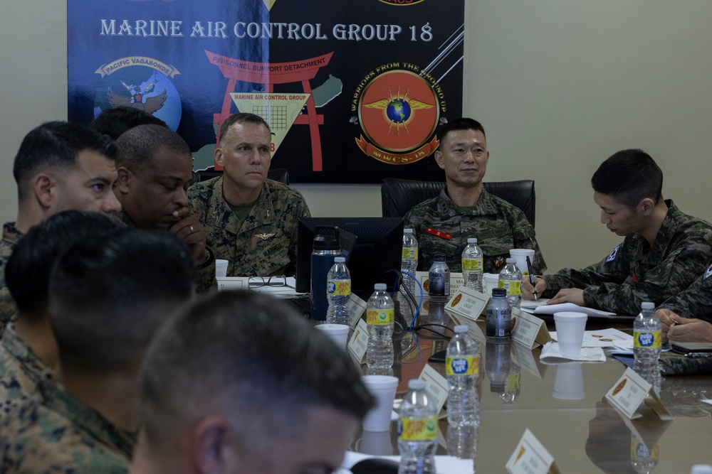 U.S. Marines of Marine Air Control Group 18 meet with Marines of Republic of Korea