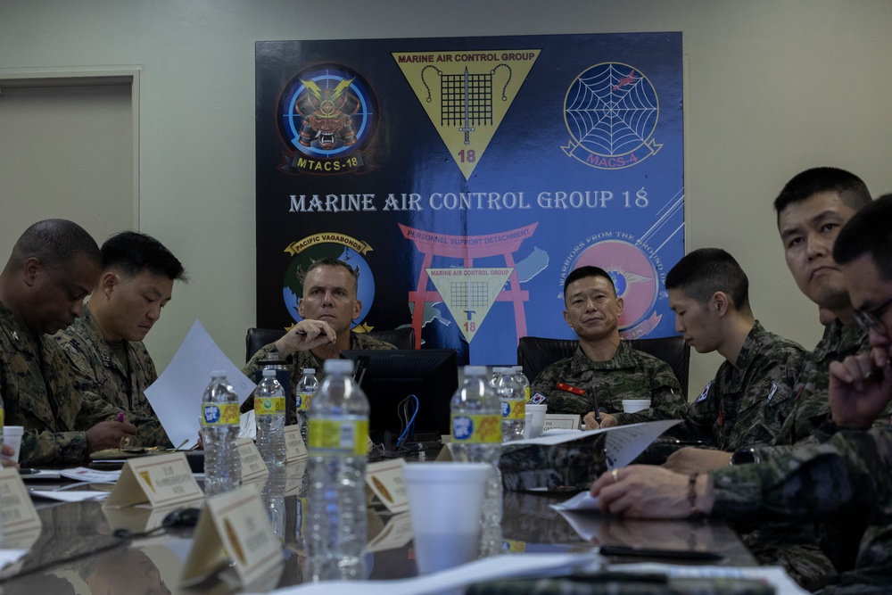 U.S. Marines of Marine Air Control Group 18 meet with Marines of Republic of Korea