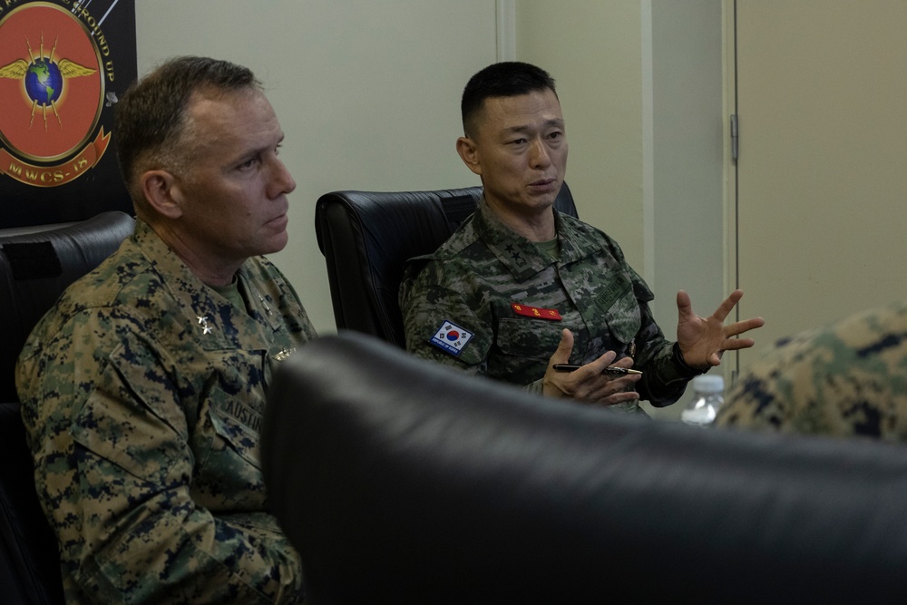 U.S. Marines of Marine Air Control Group 18 meet with Marines of Republic of Korea