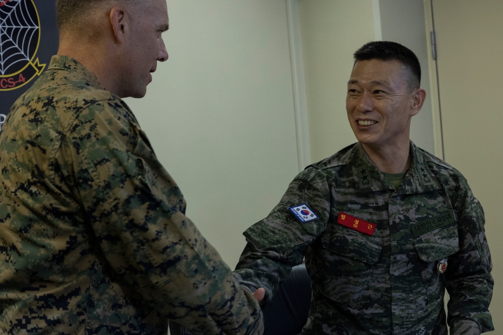 U.S. Marines of Marine Air Control Group 18 meet with Marines of Republic of Korea