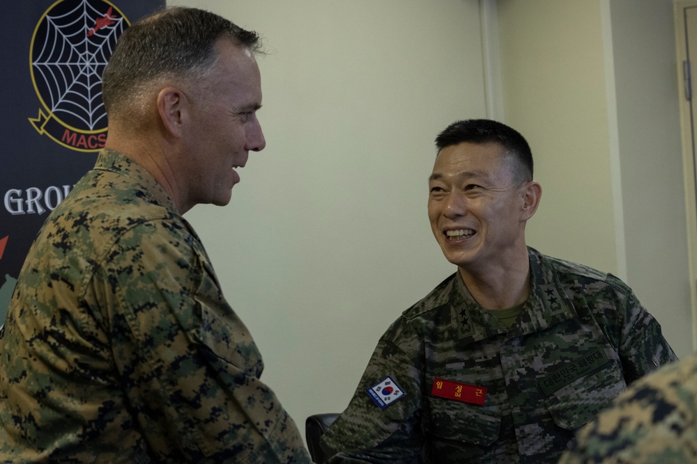 U.S. Marines of Marine Air Control Group 18 meet with Marines of Republic of Korea