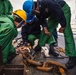 USS Paul Ignatius (DDG 117) Sailors Remove Anchor Chain Link