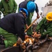 USS Paul Ignatius (DDG 117) Sailors Remove Anchor Chain Link