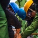 USS Paul Ignatius (DDG 117) Sailors Remove Anchor Chain Link