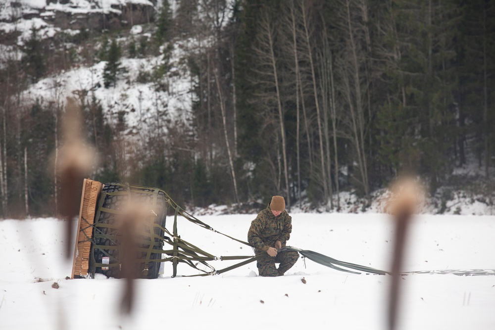 U.S. Marines with Combat Logistics 6 Conduct an Aerial Delivery with Finnish KASA 295 Aircraft