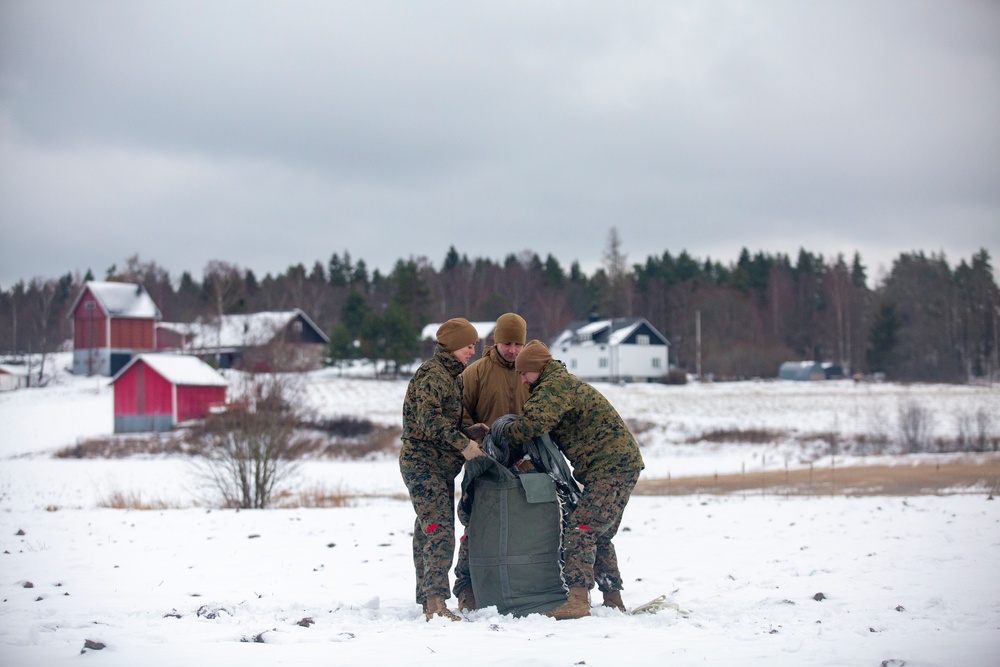 U.S. Marines with Combat Logistics 6 Conduct an Aerial Delivery with Finnish KASA 295 Aircraft