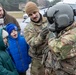 U.S. Army Spc. Matos Teaches Polish Elementary Children About Flight gear