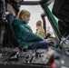 Polish Elementary School student sits inside of an UH-60 Blackhawk