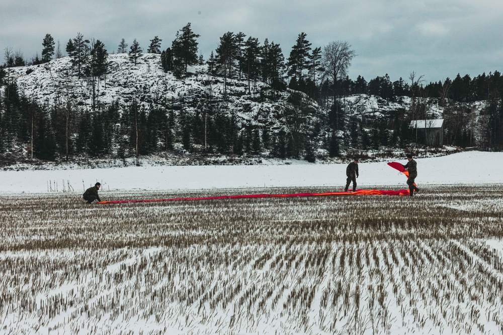 U.S. Marines with Combat Logistics 6 Conduct an Aerial Delivery with Finnish KASA 295 Aircraft