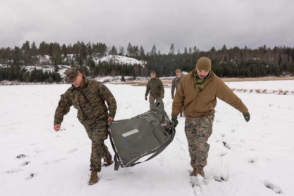 U.S. Marines with Combat Logistics 6 Conduct an Aerial Delivery with Finnish KASA 295 Aircraft