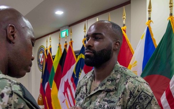 K.C. Native Meritoriously Promoted by U.S. Navy in Singapore