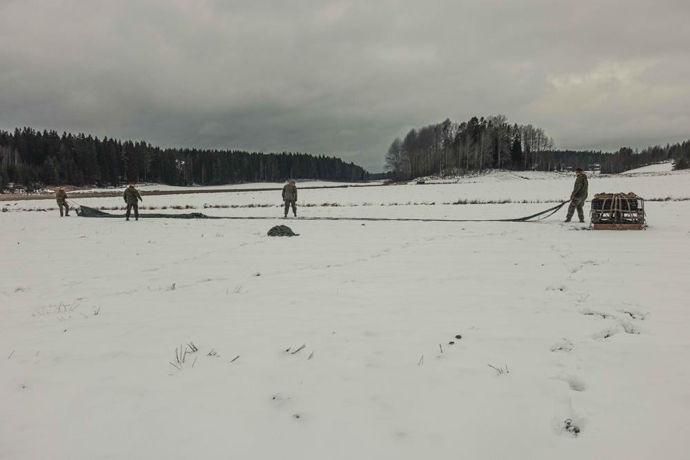 U.S. Marines with Combat Logistics 6 Conduct an Aerial Delivery with Finnish KASA 295 Aircraft