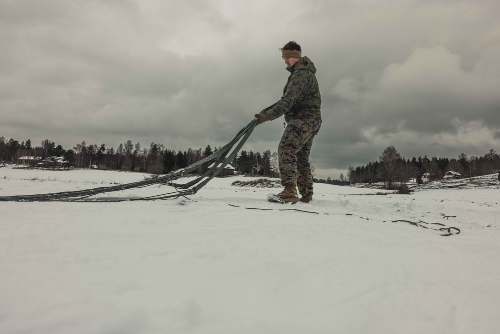 U.S. Marines with Combat Logistics 6 Conduct an Aerial Delivery with Finnish KASA 295 Aircraft