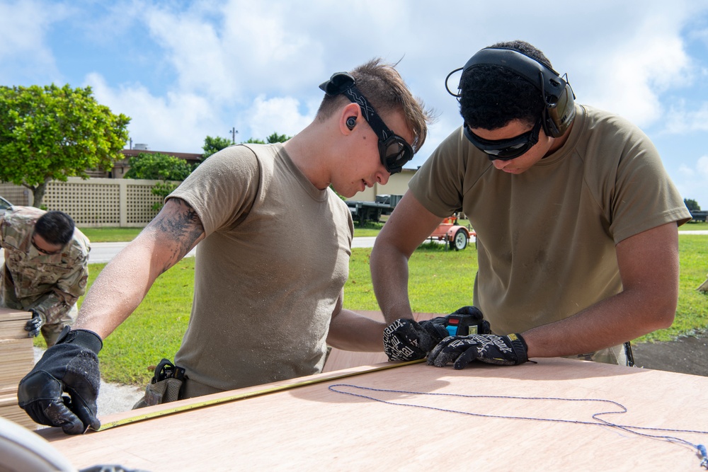 Yokota’s CFM Airmen prepare for bundle building during Operation Christmas Drop 2022