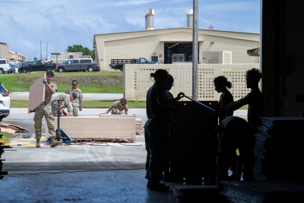 Yokota’s CFM Airmen prepare for bundle building during Operation Christmas Drop 2022