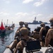 Nitze Sailors give supplies to civilian fishermen
