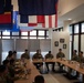 Maj. Gen. Todd R. Wasmund answers questions during lunch with junior NCOs