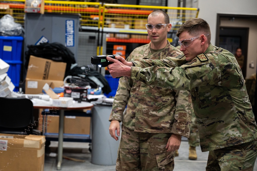 Airmen conduct taser training