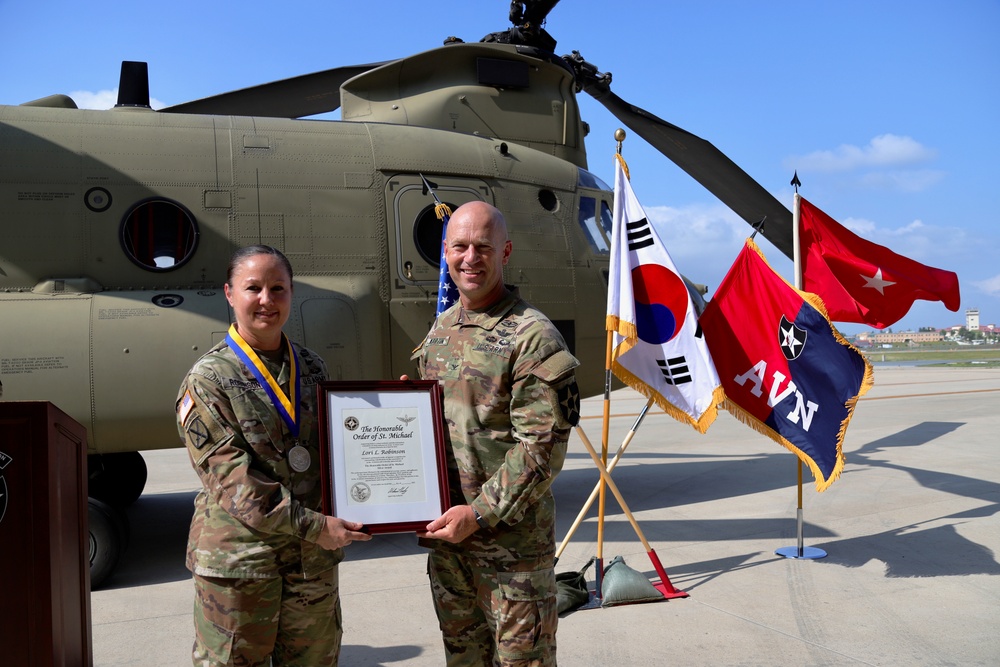 Brig. Gen. Lori Robinson Receives Order of St. Michael Silver Award