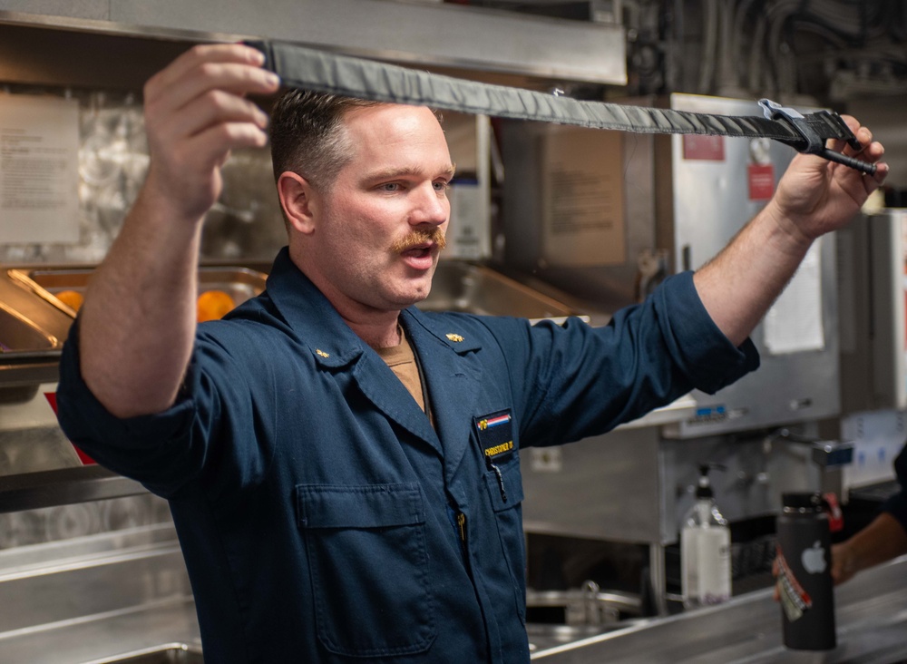 USS Ronald Reagan (CVN 76) Sailors conduct Tactical Combat Casualty Care training