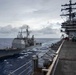 USS Ronald Reagan (CVN 76) conducts fueling-at-sea with USS Shiloh (CG 67)