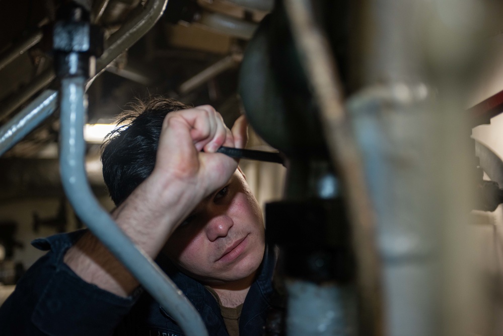 USS Ronald Reagan (CVN 76) Sailors conduct corrective maintenance