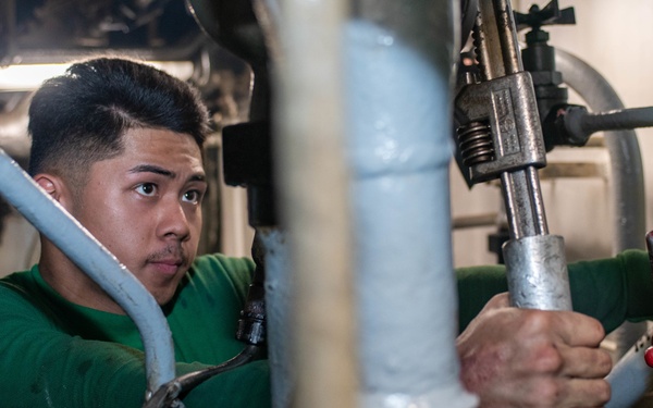 USS Ronald Reagan (CVN 76) Sailors conduct corrective maintenance