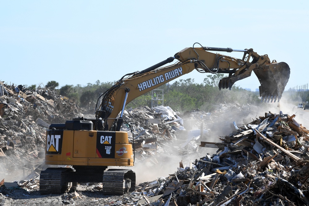 Crews Continue Work At Debris Collection Sites