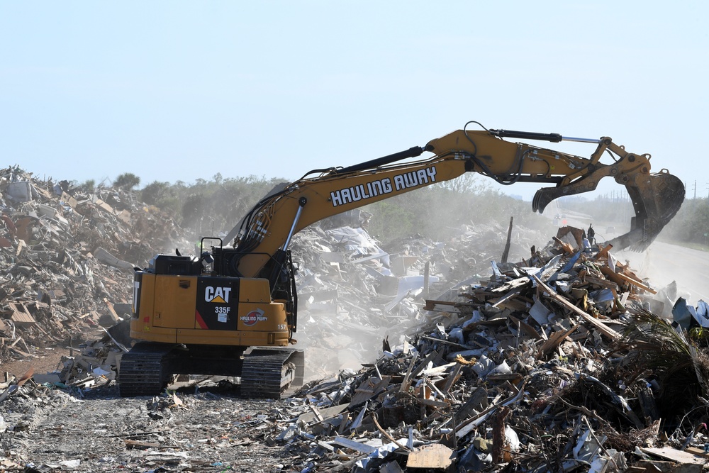 Crews Continue Work At Debris Collection Sites