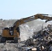 Crews Continue Work At Debris Collection Sites