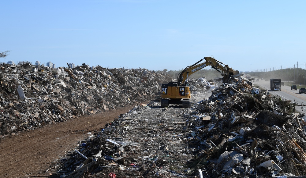 Crews Continue Work At Debris Collection Sites