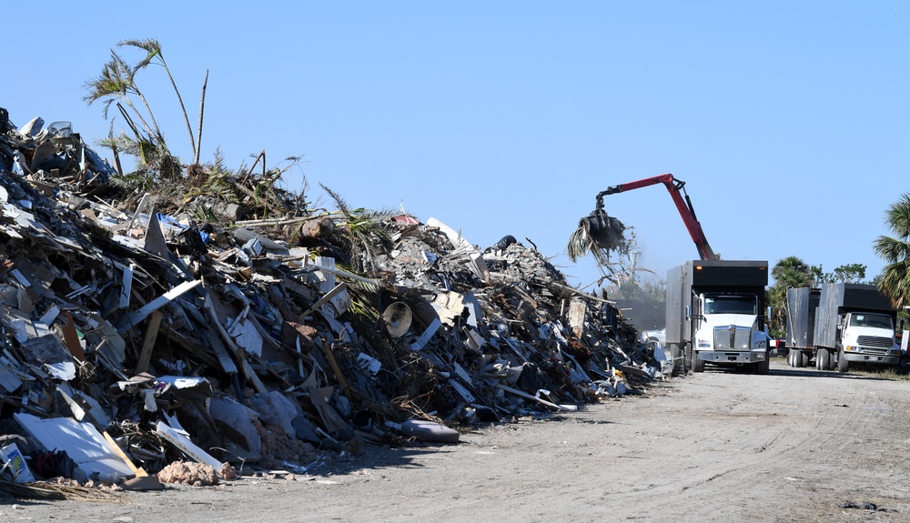 Crews Continue Work At Debris Collection Sites