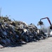 Crews Continue Work At Debris Collection Sites