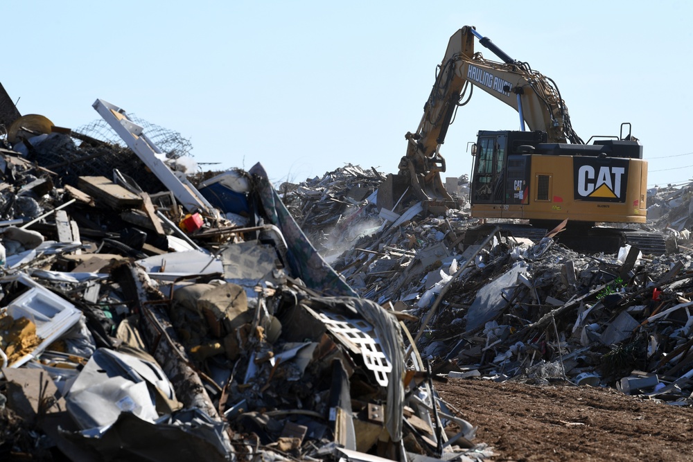 Crews Continue Work At Debris Collection Sites