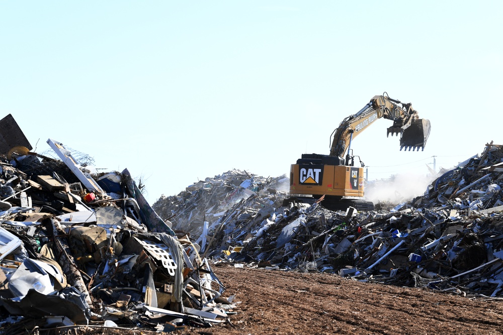 Crews Continue Work At Debris Collection Sites