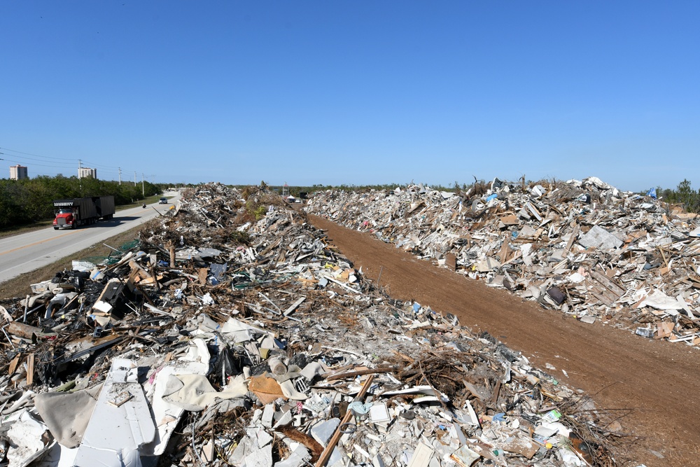 Crews Continue Work At Debris Collection Sites