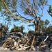 Streets Remain Stacked With Debris Following Hurricane Ian