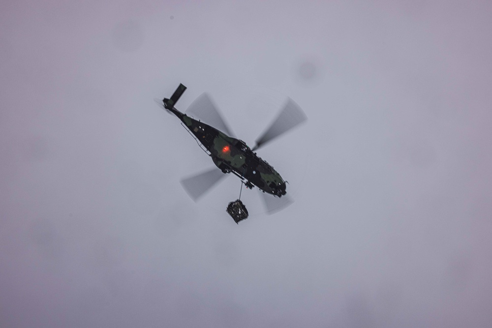 U.S. Marines with Combat Logistics 6 Conduct an Helicopter Lift with Finnish NH90 Aircraft